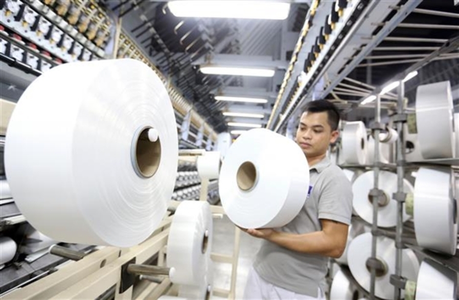 Inside a yarn production company. Việt Nam’s export turnover to Germany enjoyed a year-on-year surge of 30.5 per cent to US$7.6 billion in the first 10 months of this year. — VNA/VNS Photo